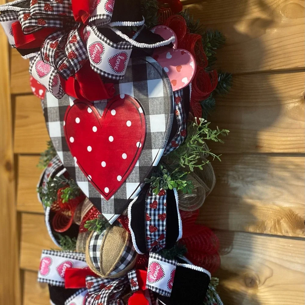 Heart-Themed Holiday Wreath with Red and Black Accents